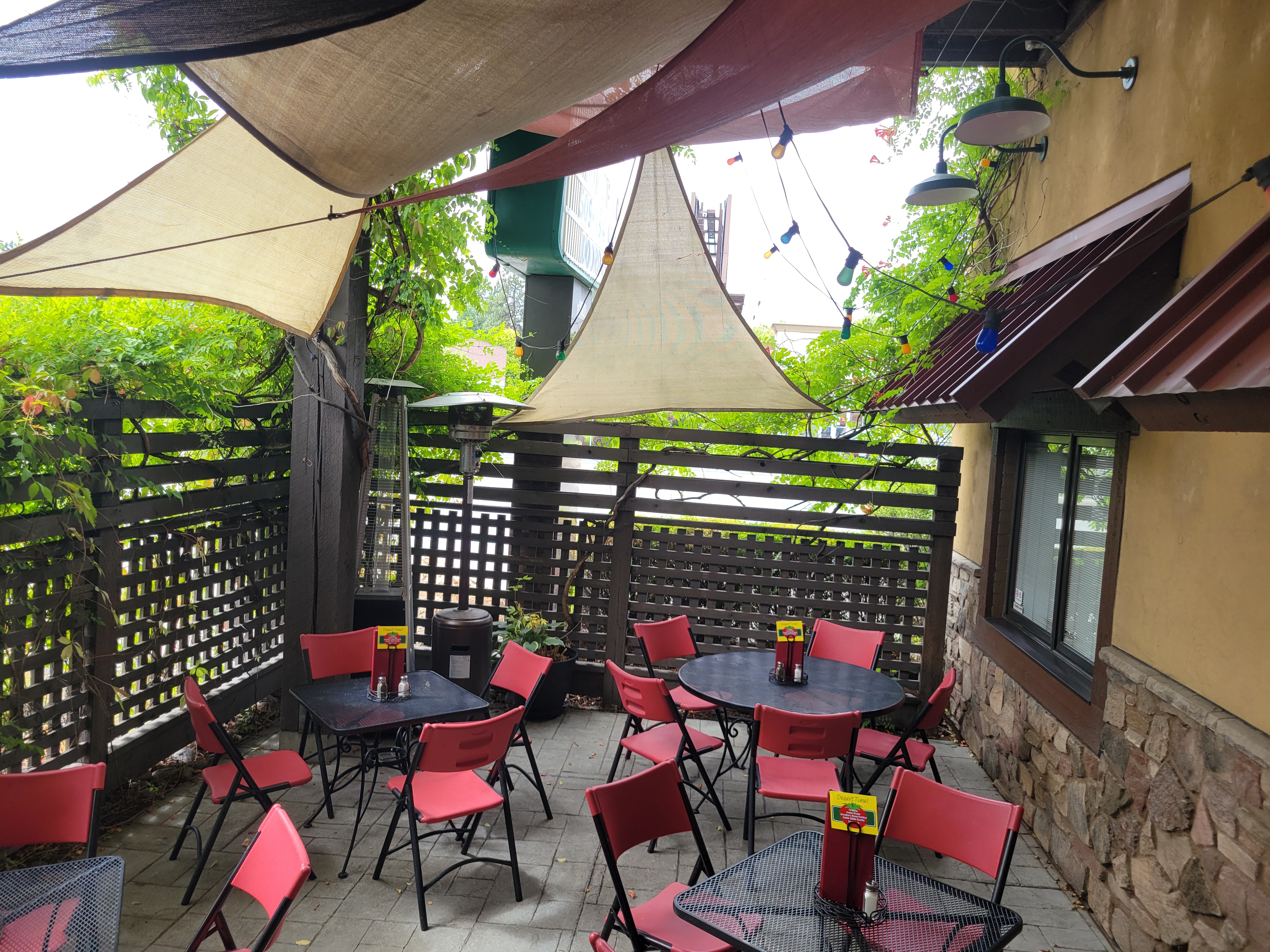 Patio with tables and chairs for outdoor dining
